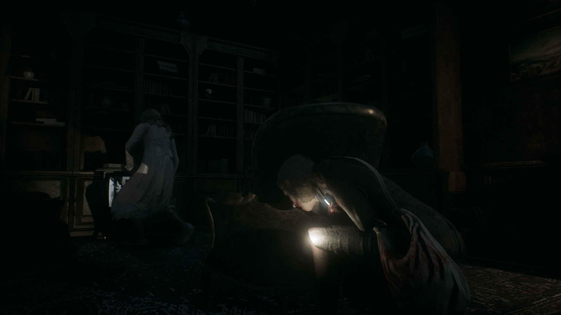 A woman hides behind furniture while a figure crosses the room.