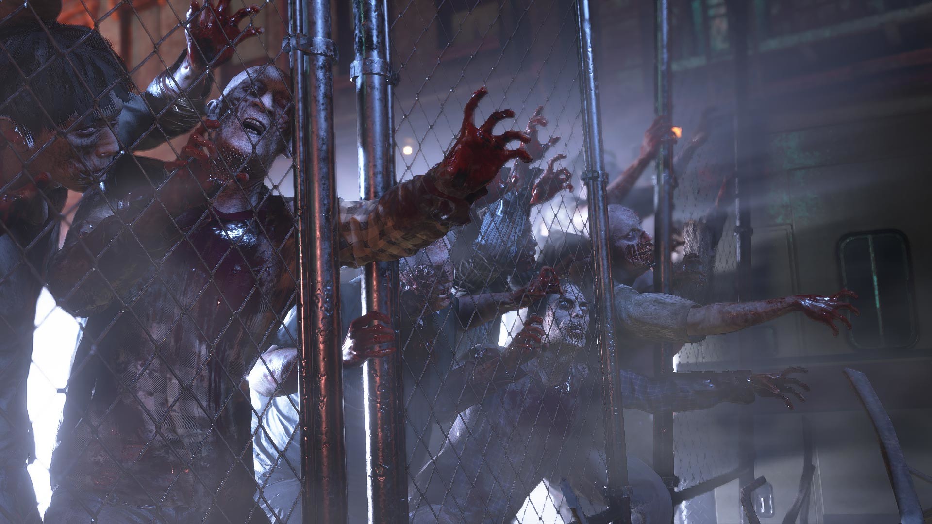 A grotesque creature presses against a metal fence.