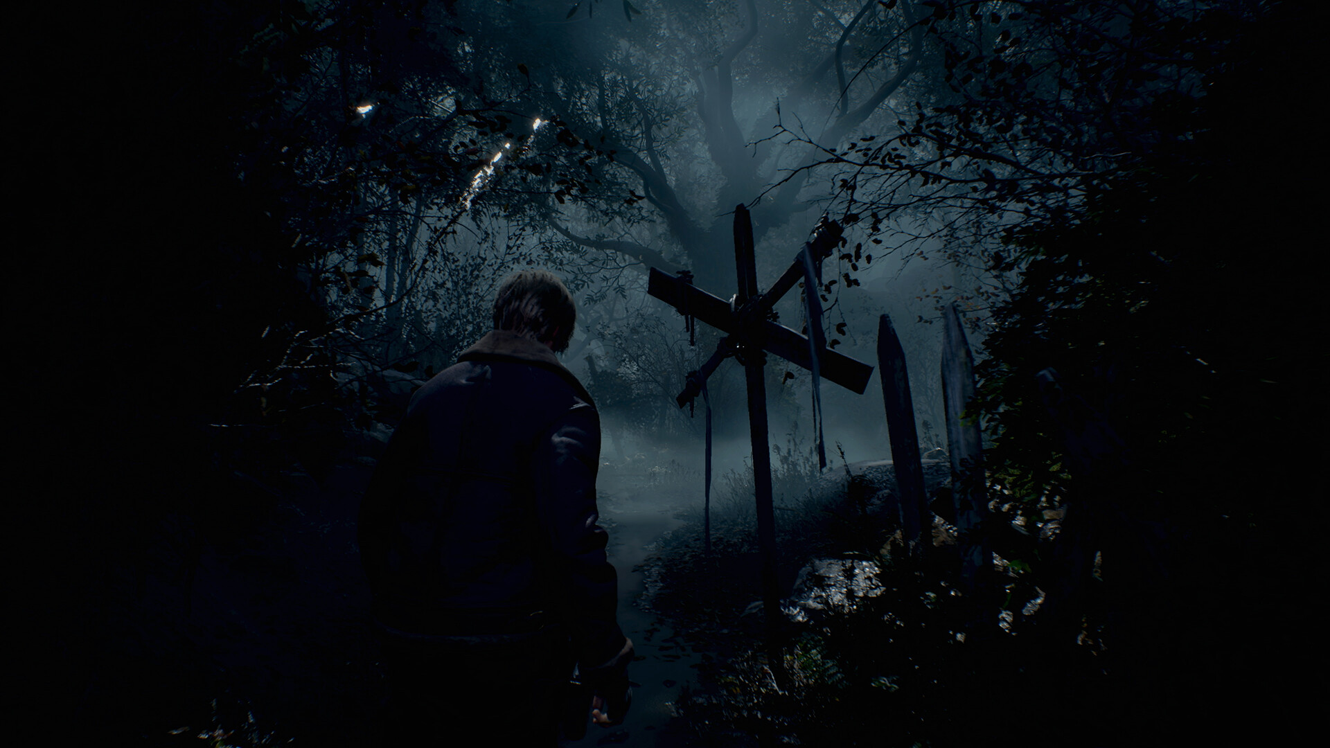 Leon follows a wooded path towards a distant light.