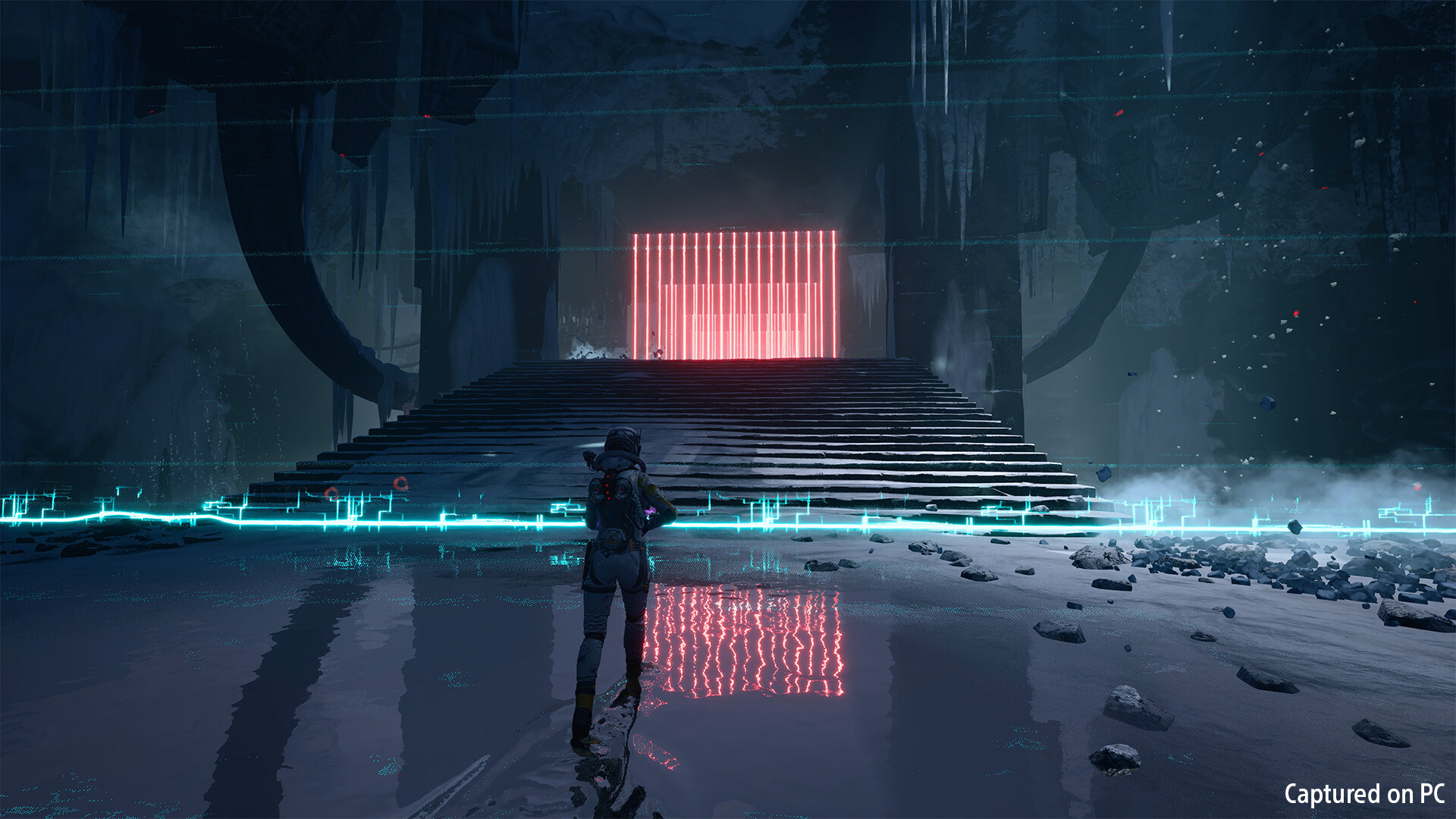 Selene approaches a sealed doorway in an alien ruin.