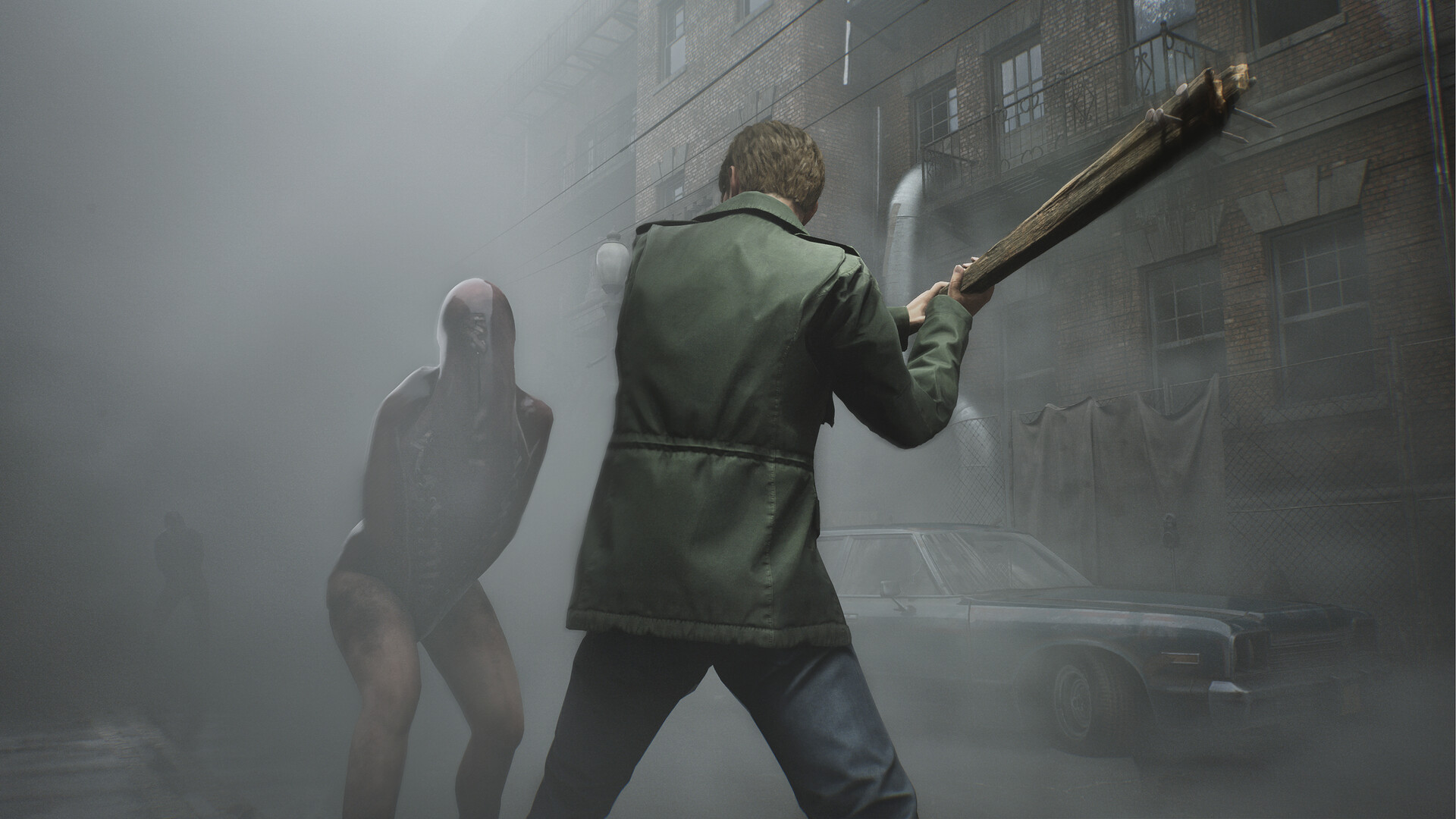 James raises a wooden weapon against a figure in the fog.