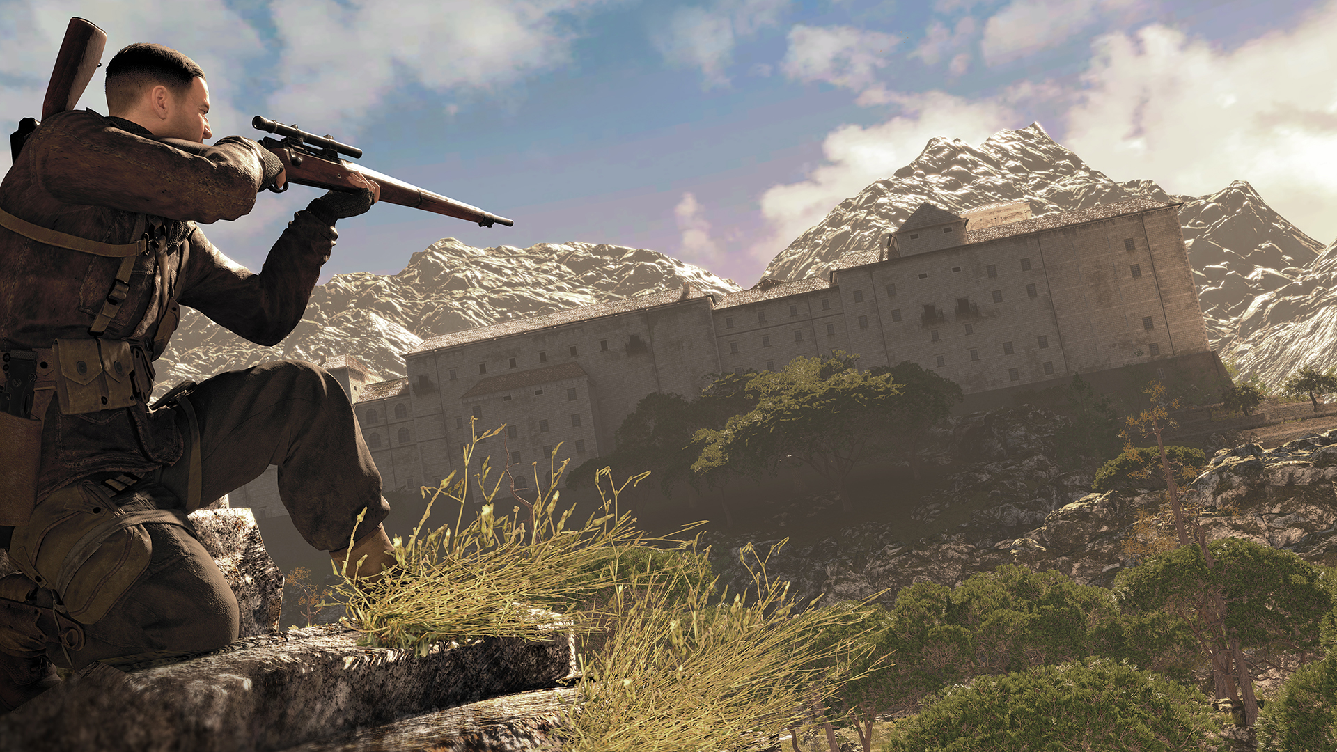 Karl surveys a hilltop fortress through his rifle scope.