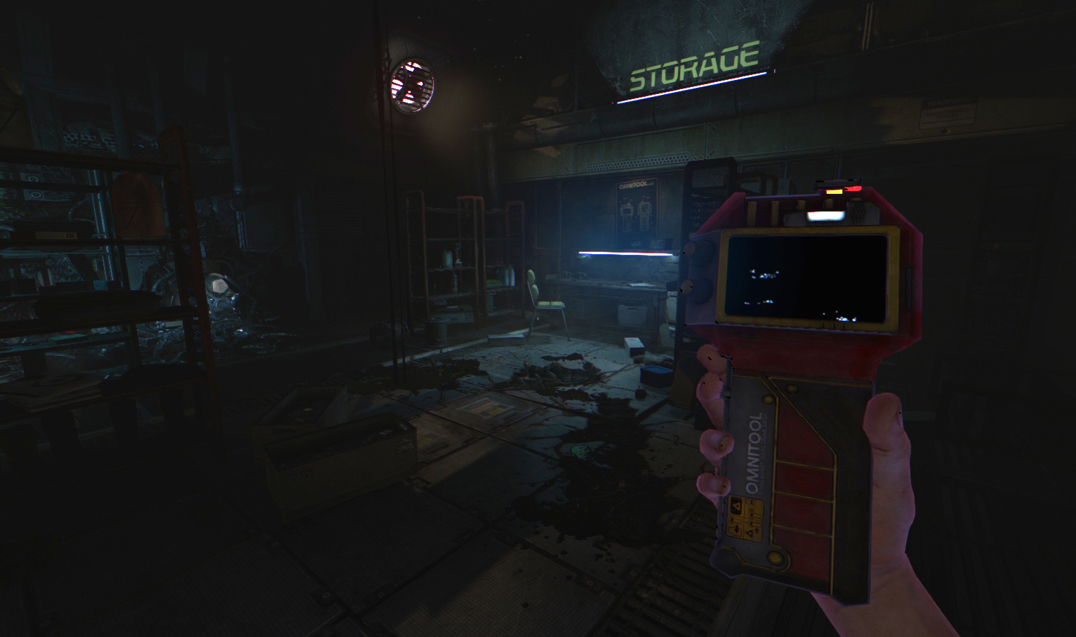 A handheld device is raised in a damaged storage corridor.