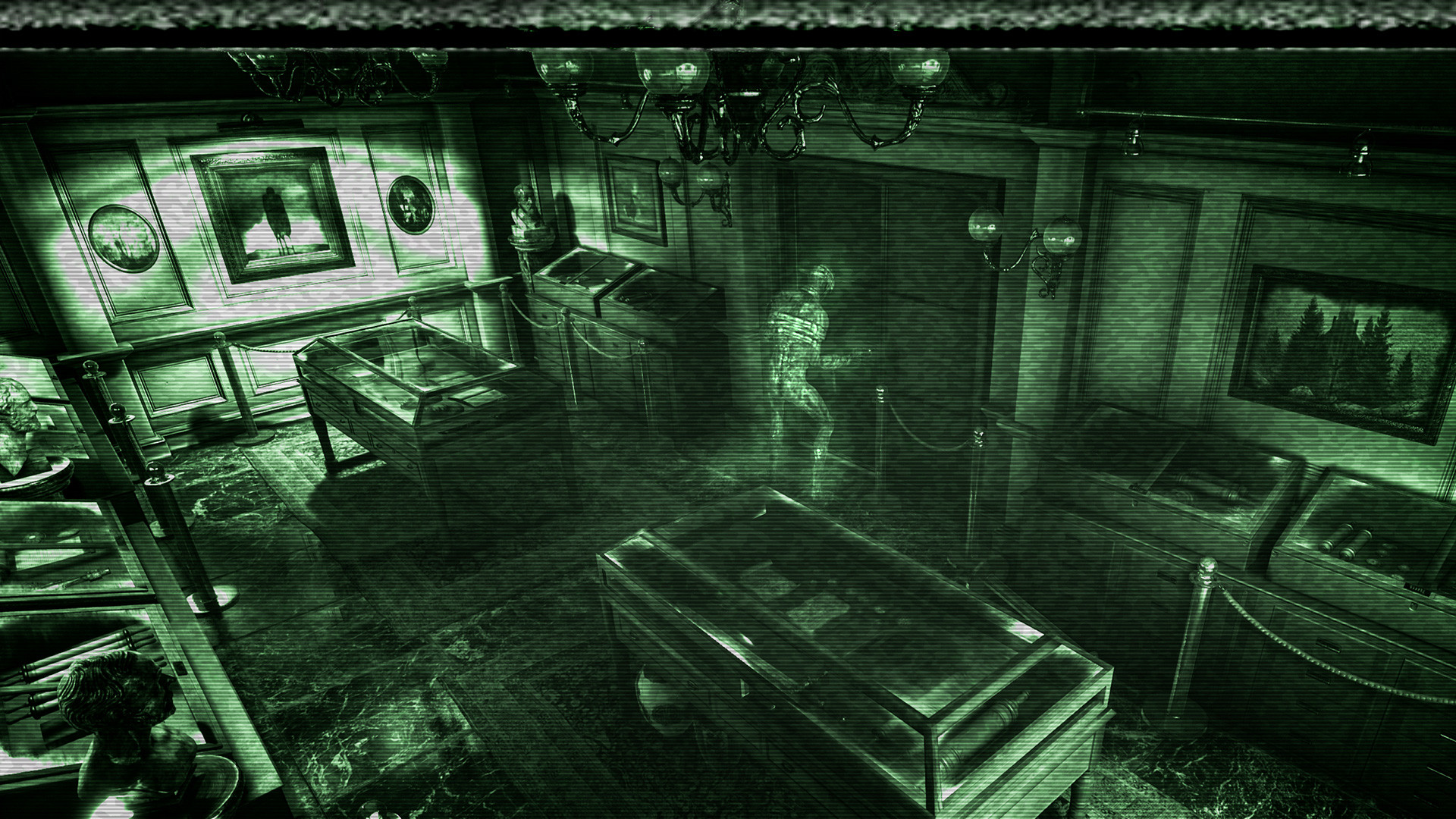 A green-tinted room appears on a surveillance monitor.
