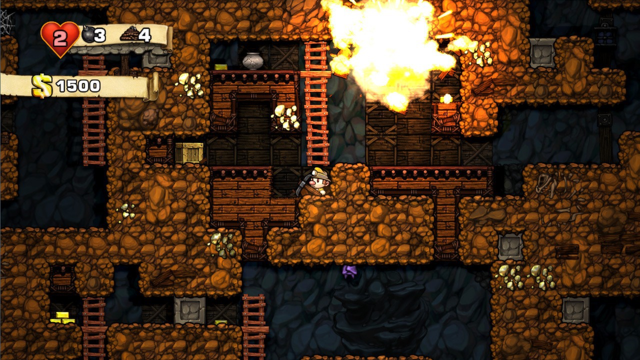 An explosion tears through a cave room in Spelunky.