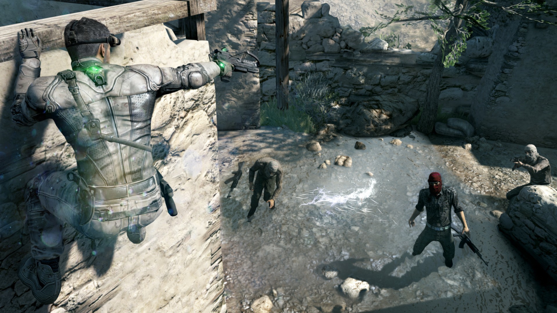 Sam Fisher moves above two guards in a rocky courtyard.