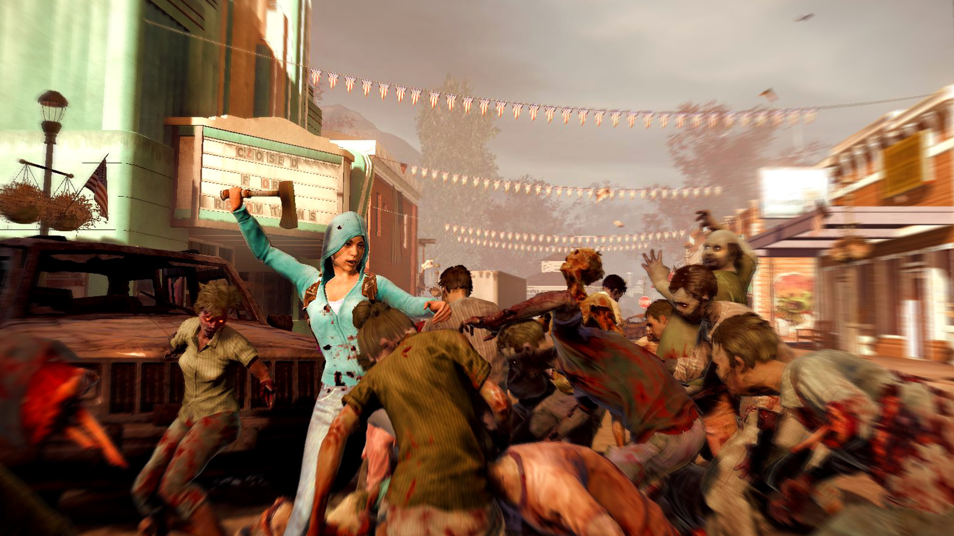 A survivor fights through a crowd of zombies on a town street.