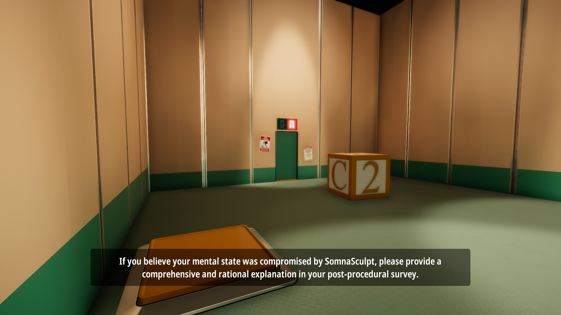An oversized letter cube sits near a door inside a sparse room.