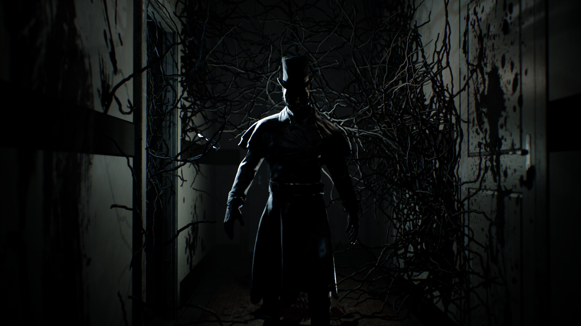 A dark figure stands before tangled branches.