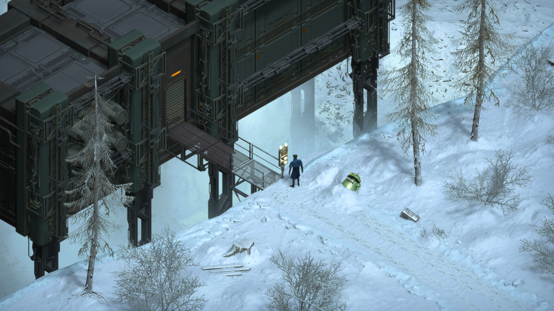 A lone figure stands outside a snowbound industrial structure.
