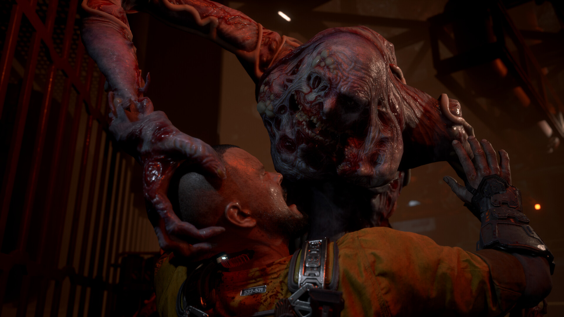 A mutated creature grabs a prisoner inside a red-lit corridor.