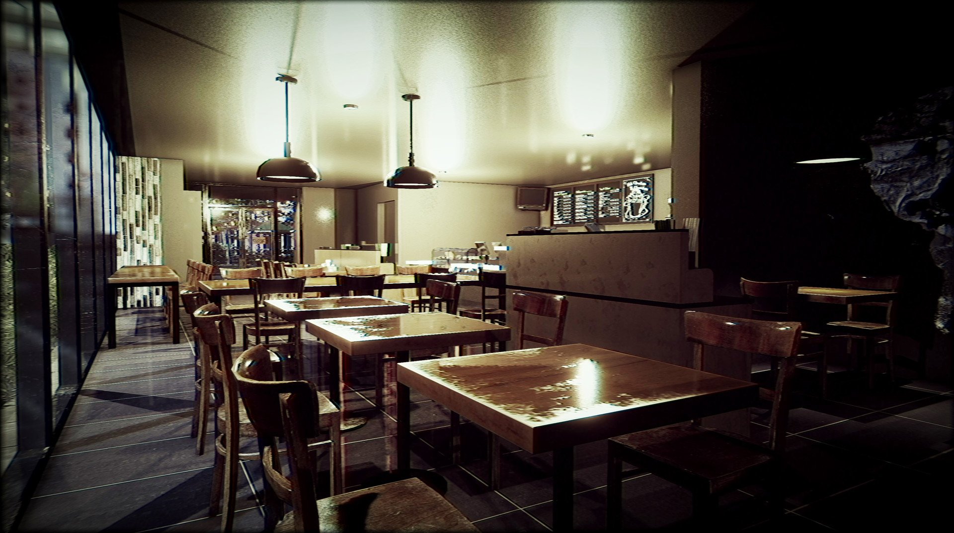 Empty tables face the counter inside Chilla’s Coffee.