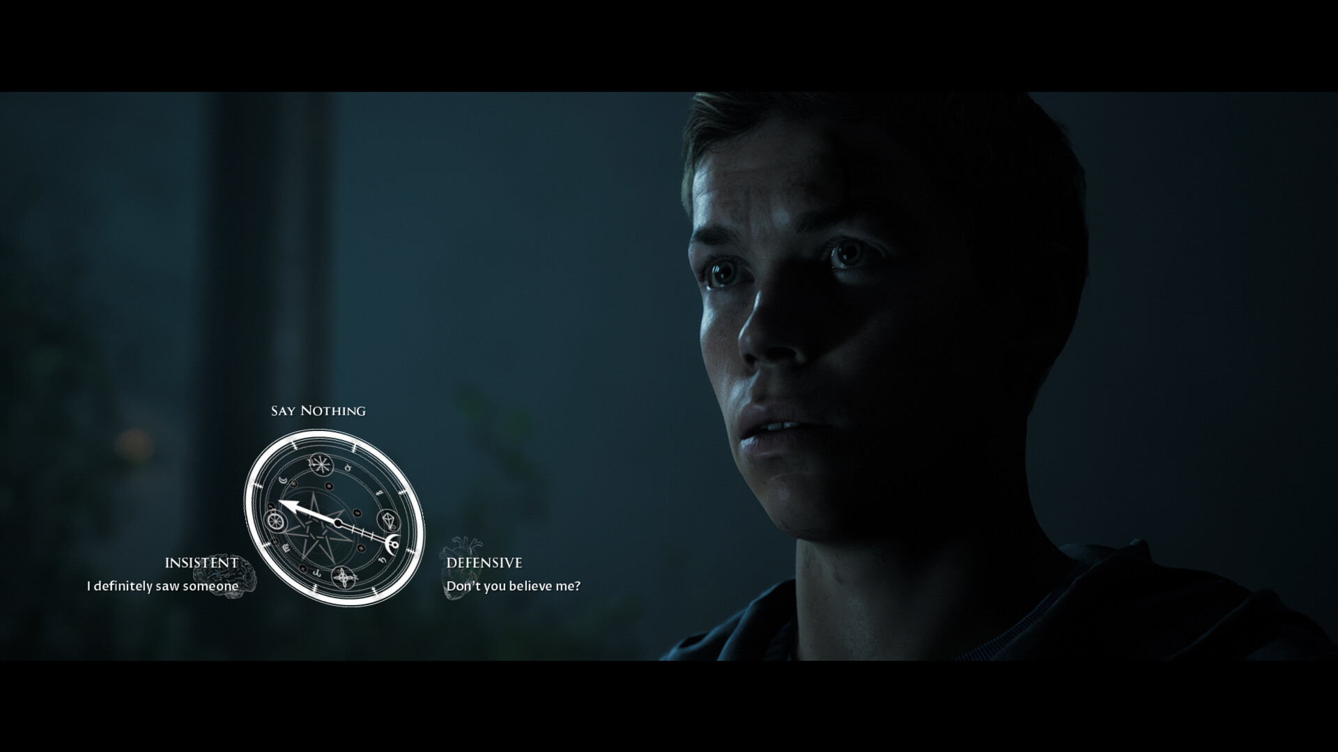 A young man faces a dialogue choice in a dim room.