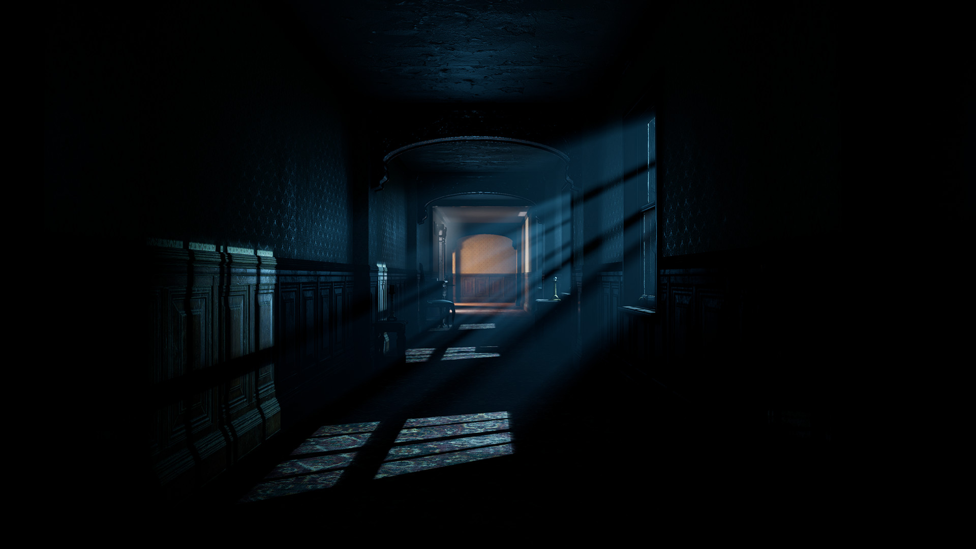 Light falls across an empty corridor.