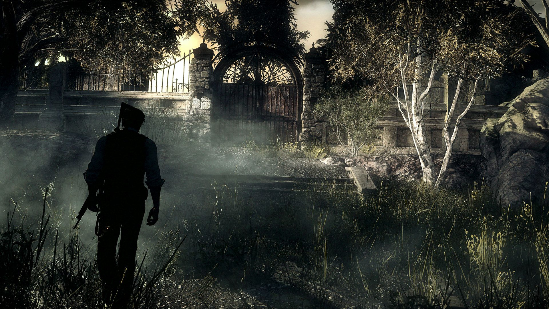 Sebastian approaches a gated building through a foggy landscape.