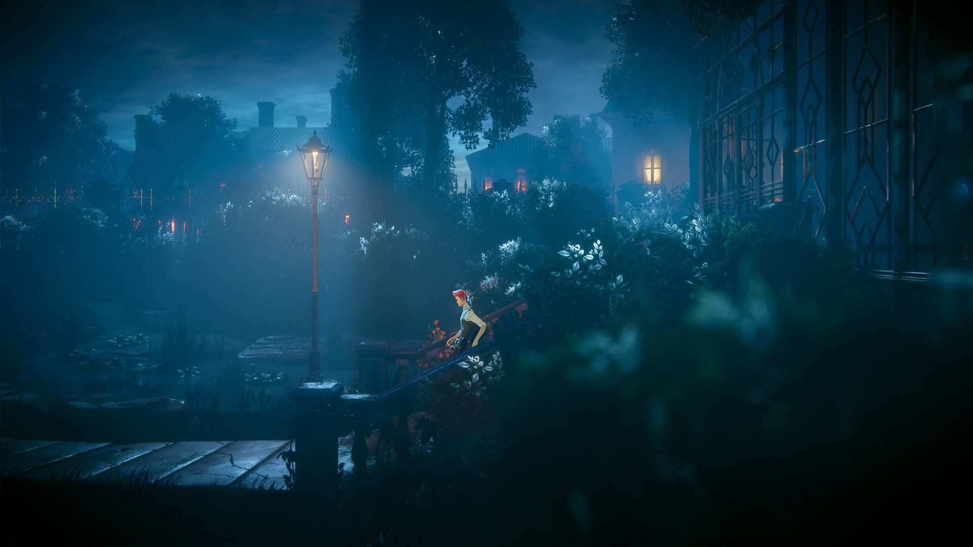 Benedict crosses a blue-lit wooded area beside the mansion.