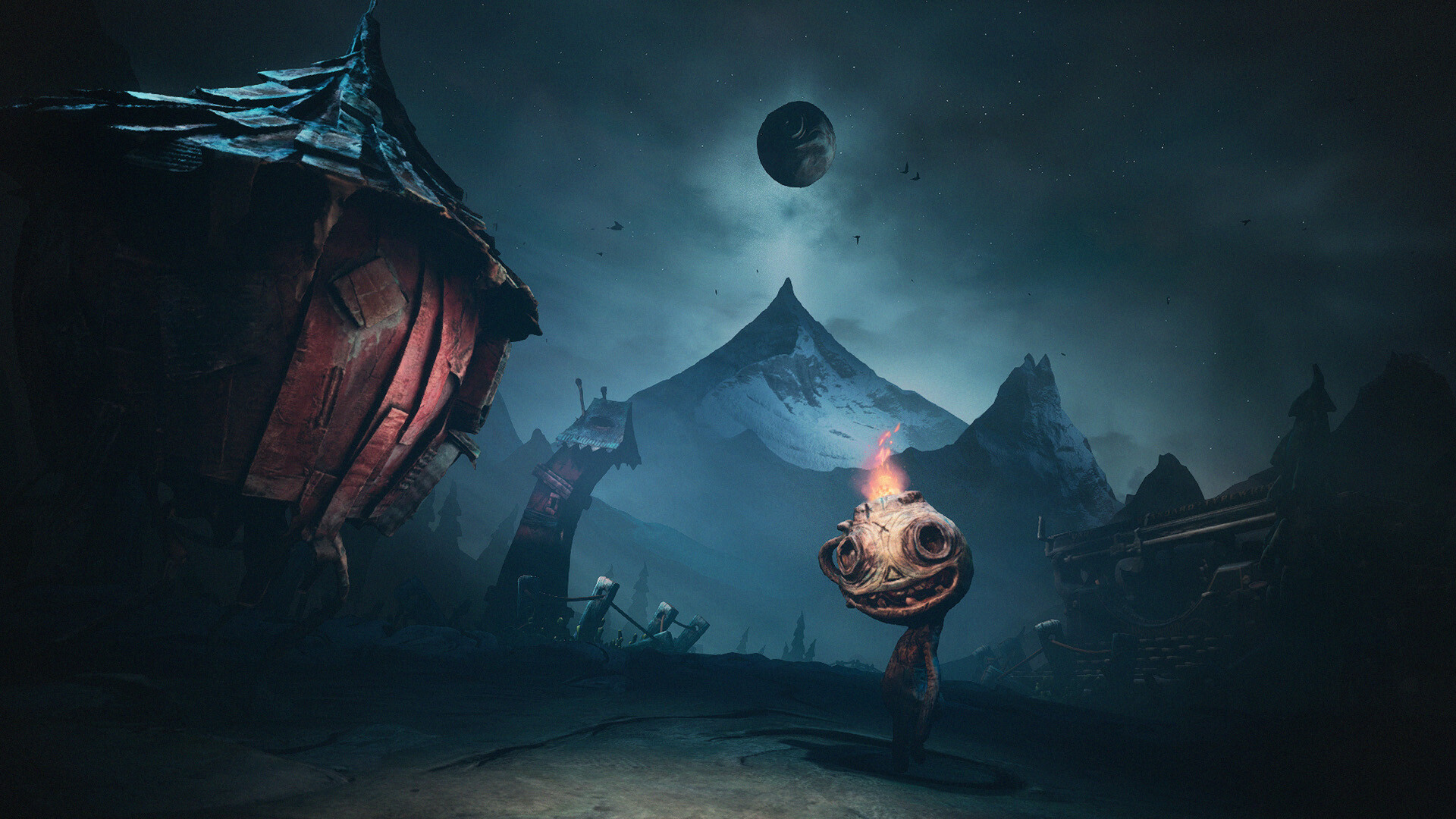 A flame-headed creature stands under a dark sky.