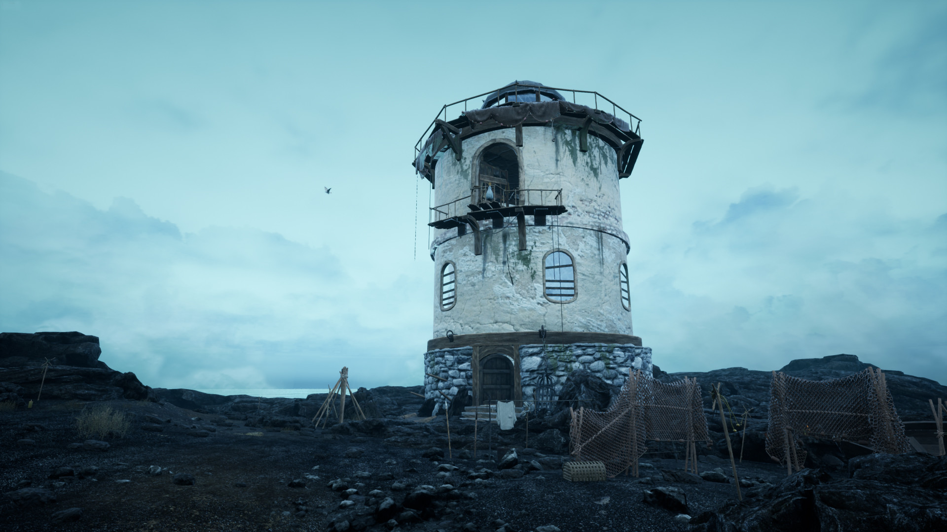 A weathered tower rises over an isolated shore.