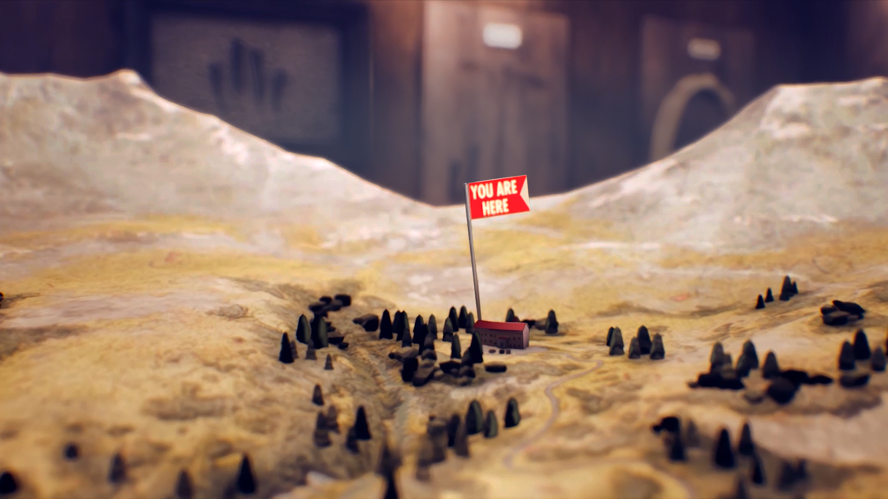 A small model shows a group beneath a red sign.