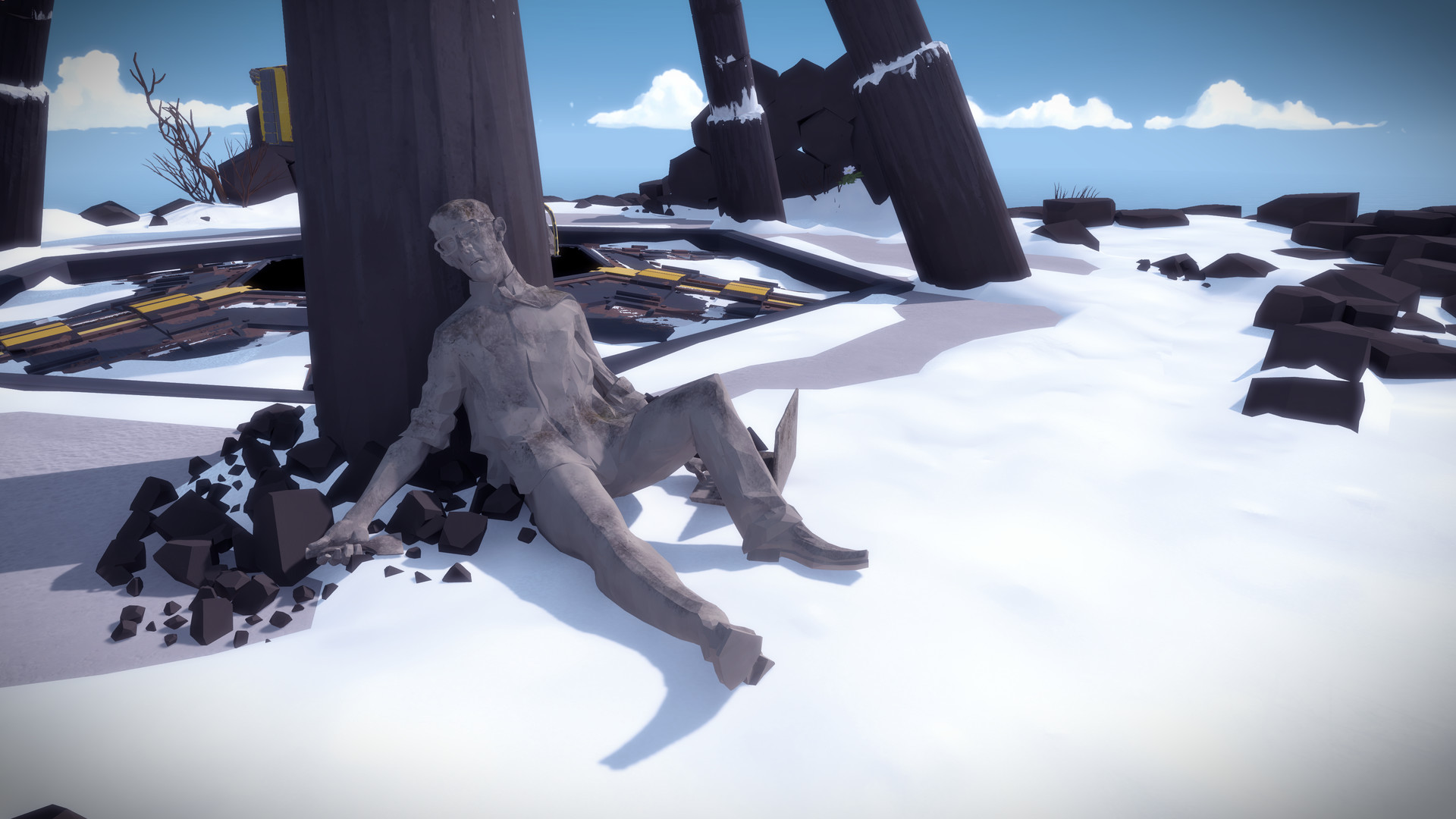 A seated stone figure rests in a snowy part of the island.