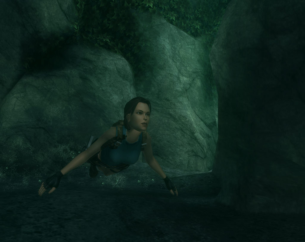 Lara swims through a submerged passage.