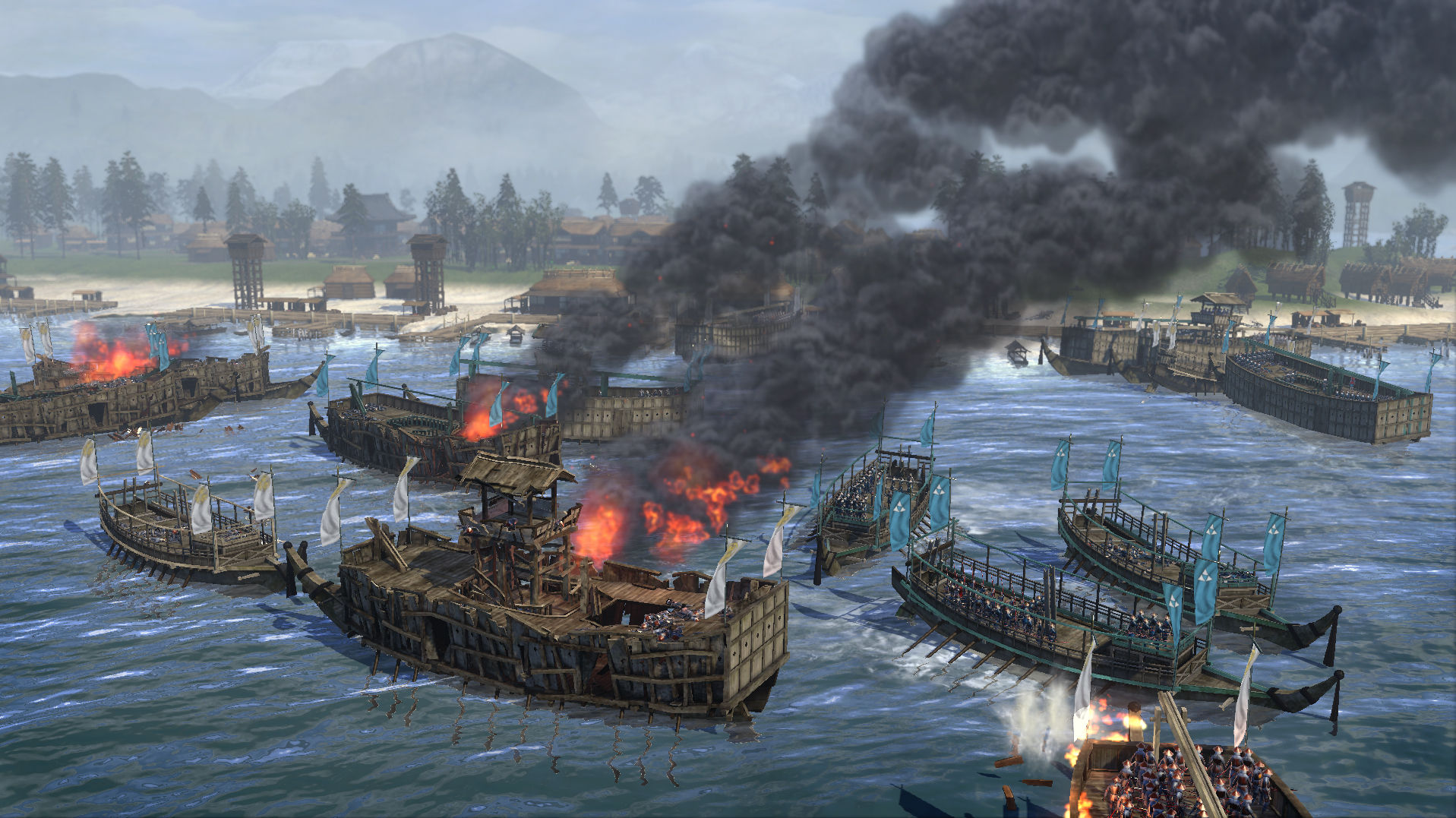 Warships burn during a naval engagement.