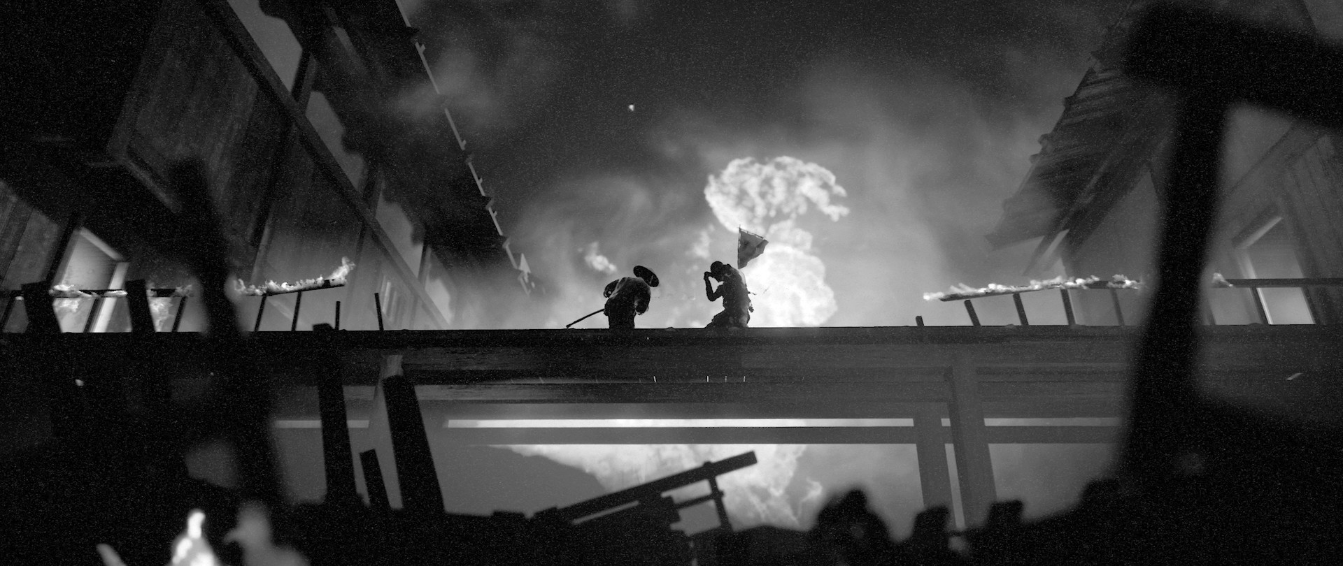 Two armed figures confront each other on a bridge above fire.
