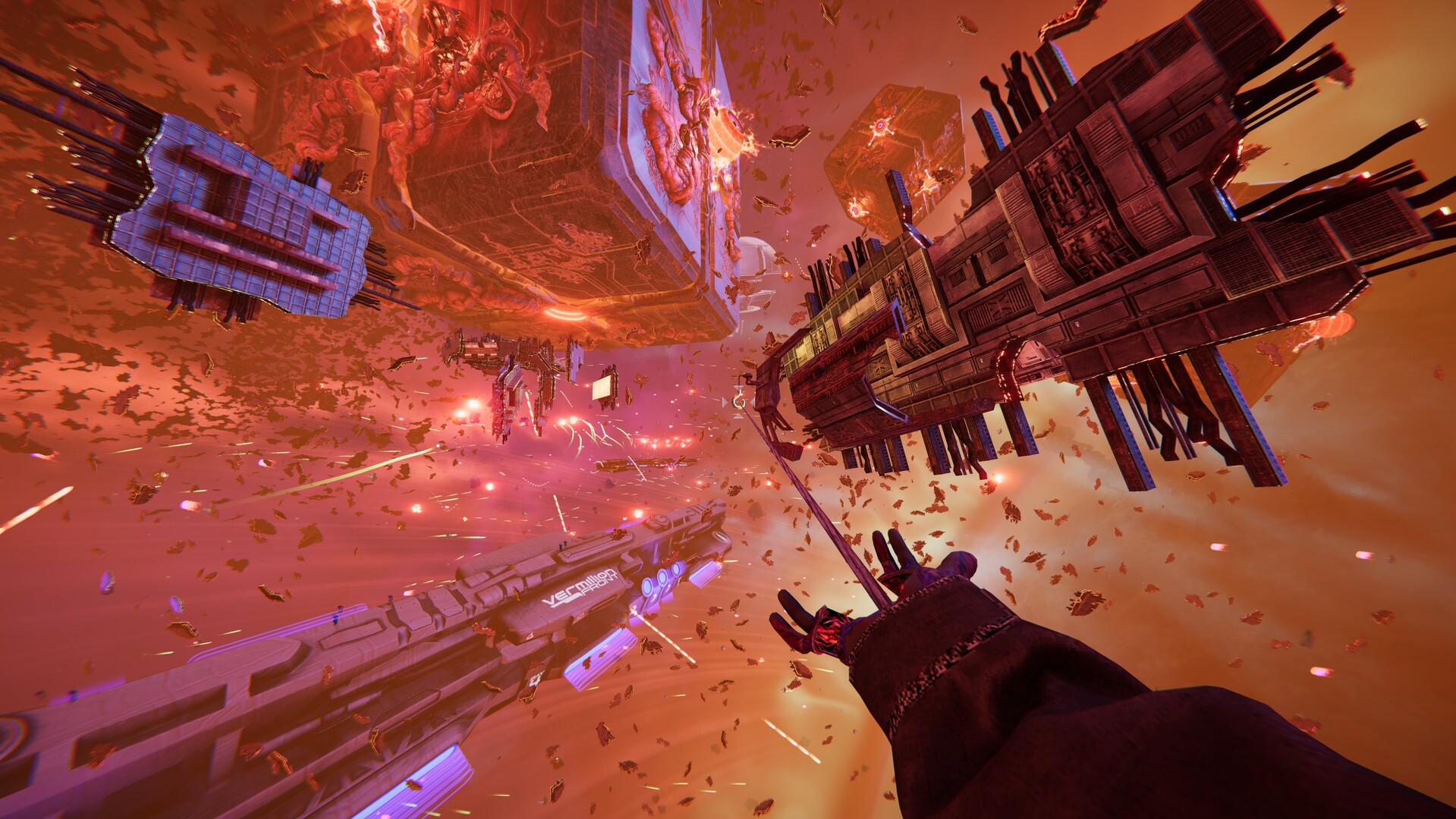 The player crosses a field of floating structures beneath an orange sky.