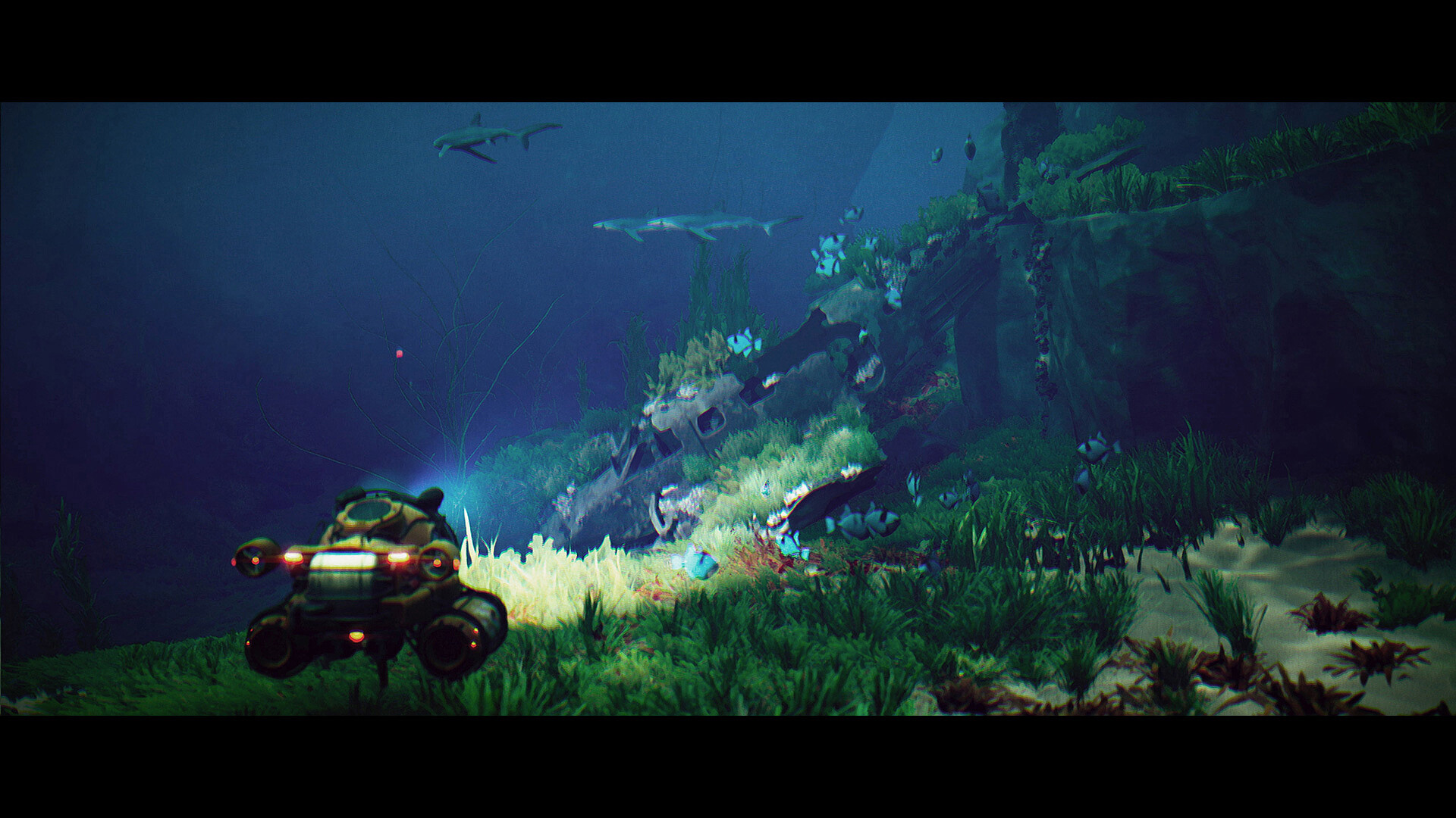 A small submersible crosses the seabed near fish and a shark.