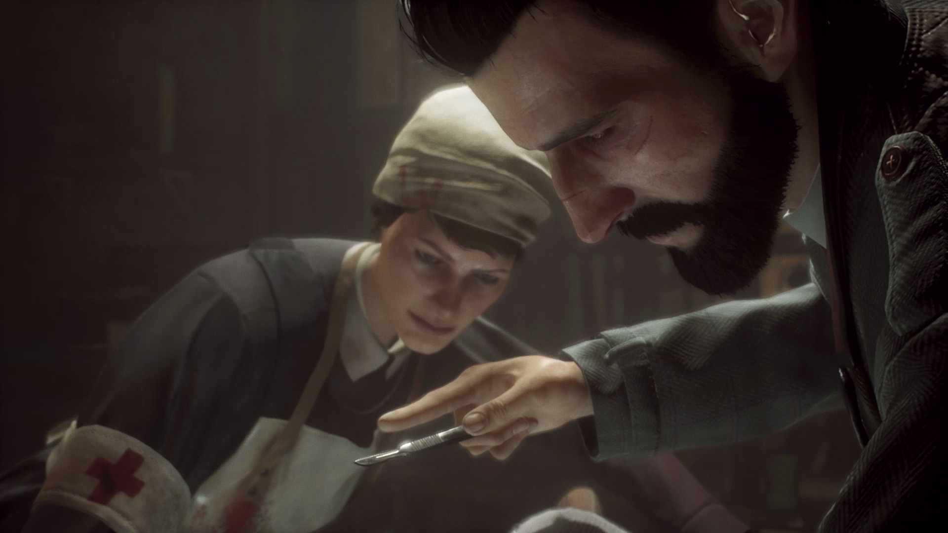 Jonathan Reid works beside a nurse during a medical scene.