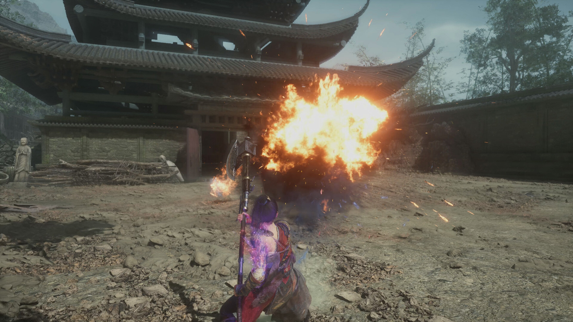 Wuchang faces a burst of fire in a temple courtyard.