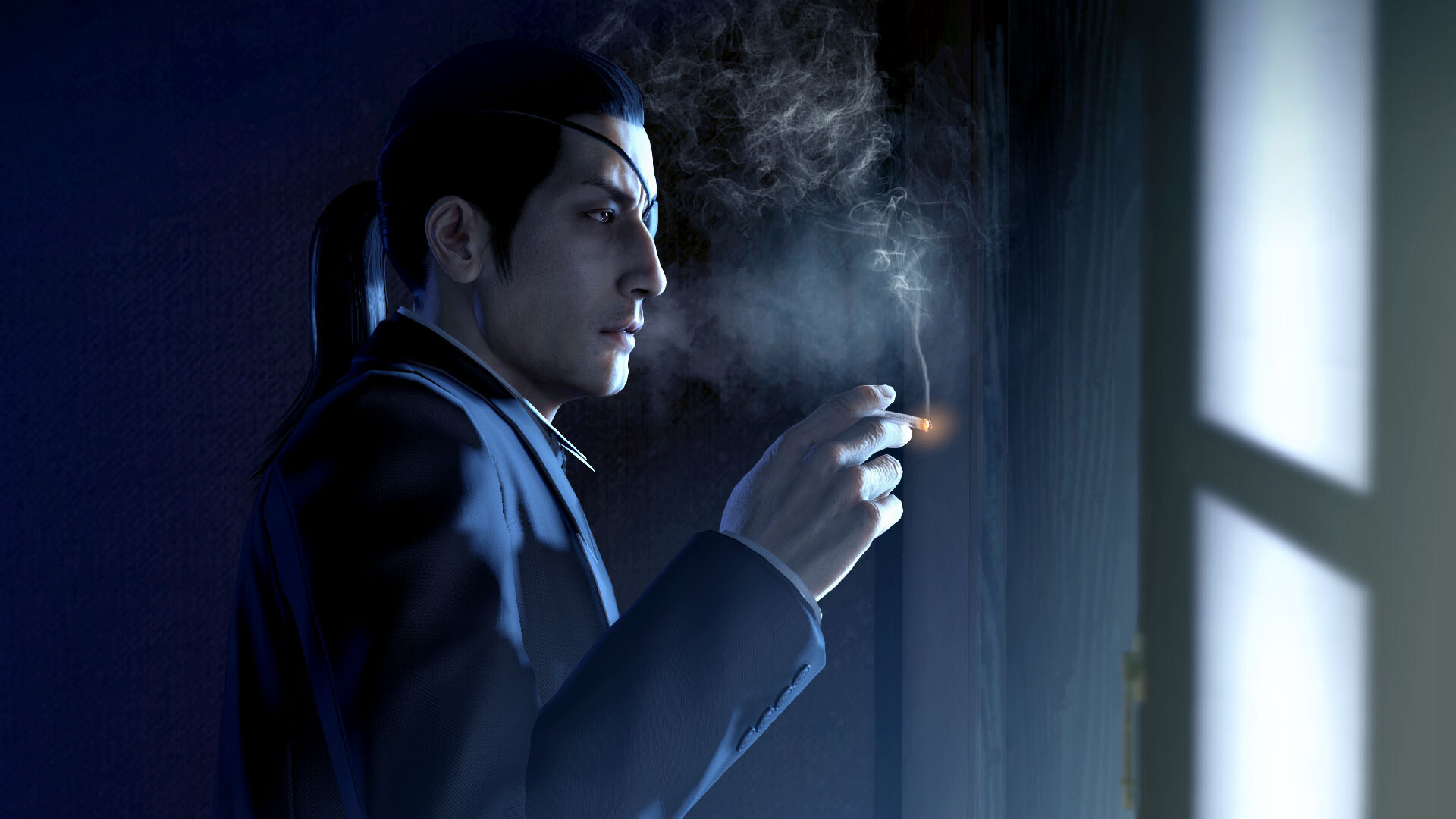 Goro Majima holds a cigarette inside a dim room.