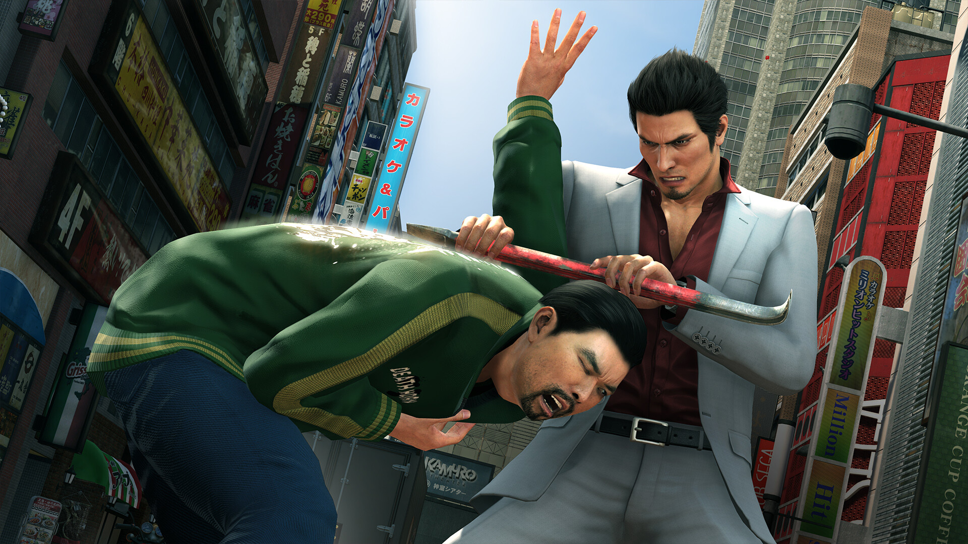 Kiryu faces an opponent in a city street fight.